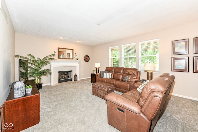 11820 Stepping Stone Dr, Fishers, IN 46037 - carpeted living room with baseboards and a fireplace with flush hearth