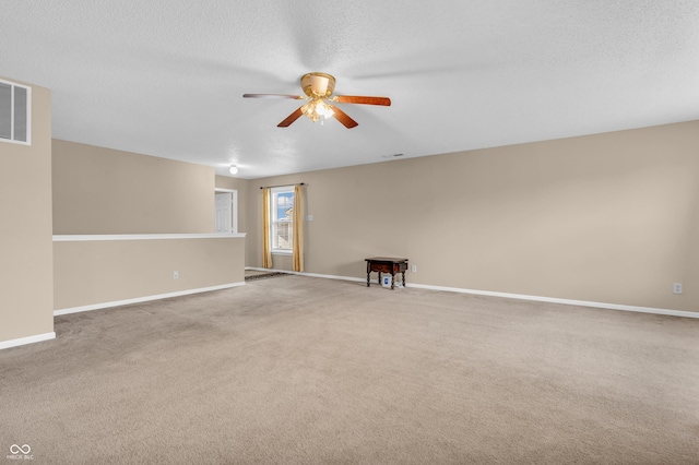 1449 Danielle Dr, Indianapolis, IN 46231 - empty room featuring a ceiling fan, carpet, and a textured ceiling