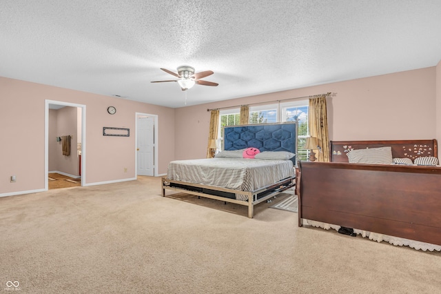 1449 Danielle Dr, Indianapolis, IN 46231 - carpeted bedroom with a textured ceiling, a ceiling fan, and ensuite bathroom