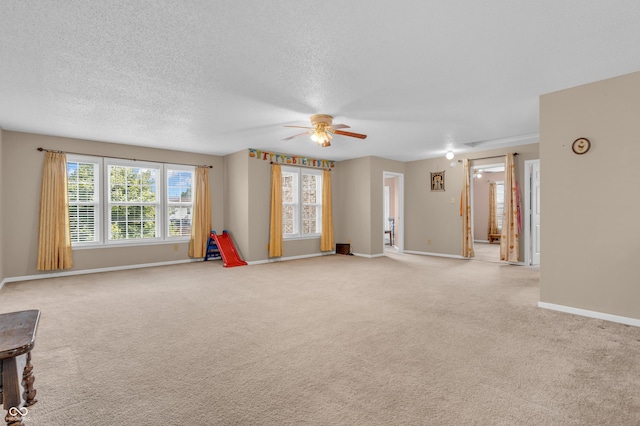 1449 Danielle Dr, Indianapolis, IN 46231 - rec room featuring a ceiling fan, light colored carpet, and a textured ceiling