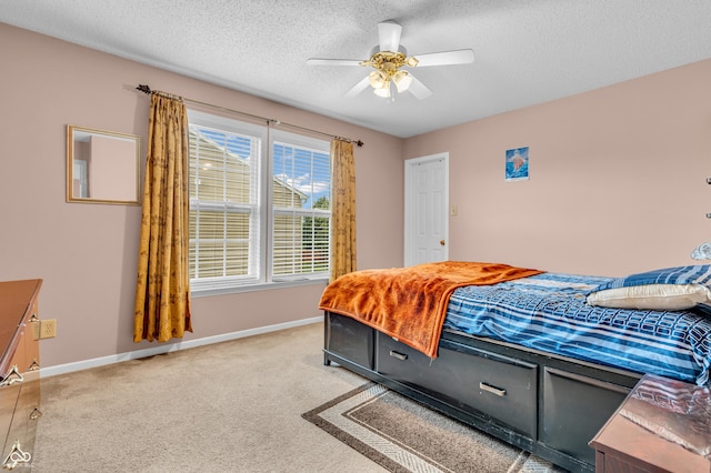 1449 Danielle Dr, Indianapolis, IN 46231 - bedroom with a textured ceiling, light carpet, and ceiling fan