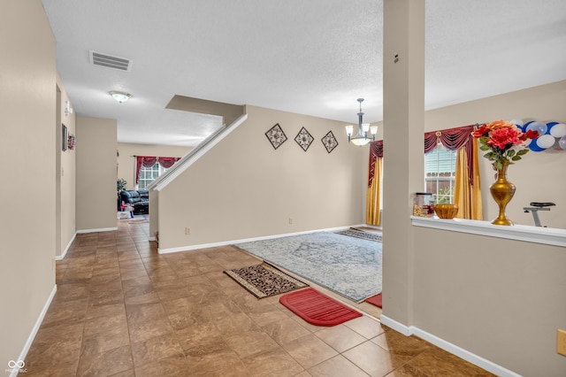 1449 Danielle Dr, Indianapolis, IN 46231 - foyer with a chandelier and baseboards