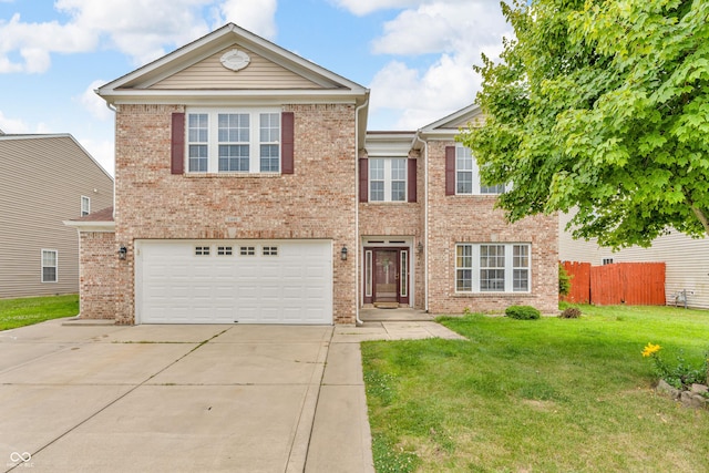 1449 Danielle Dr, Indianapolis, IN 46231 - view of front of property featuring driveway, an attached garage, and brick siding