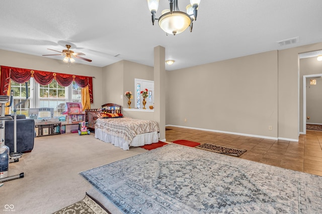 1449 Danielle Dr, Indianapolis, IN 46231 - tiled bedroom with carpet floors and a ceiling fan