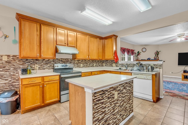 1449 Danielle Dr, Indianapolis, IN 46231 - kitchen with stainless steel electric stove, white dishwasher, under cabinet range hood, light countertops, and tasteful backsplash
