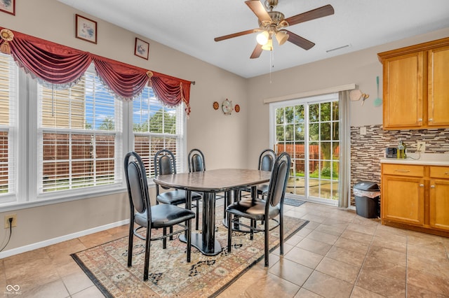1449 Danielle Dr, Indianapolis, IN 46231 - dining room with ceiling fan and light tile patterned floors
