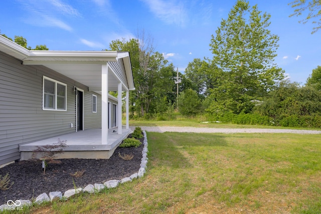 339 Honey Locust Pl, North Vernon, IN 47265 - view of green lawn featuring covered porch