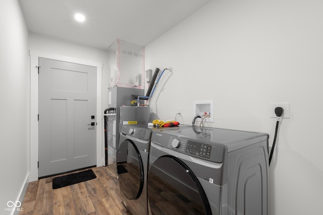 339 Honey Locust Pl, North Vernon, IN 47265 - laundry area featuring independent washer and dryer and wood finished floors