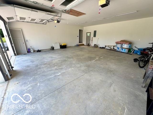 339 Honey Locust Pl, North Vernon, IN 47265 - garage featuring a garage door opener