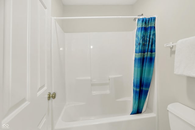 5761 Coopers Hawk Dr, Carmel, IN 46033 - bathroom featuring shower / bath combo and toilet