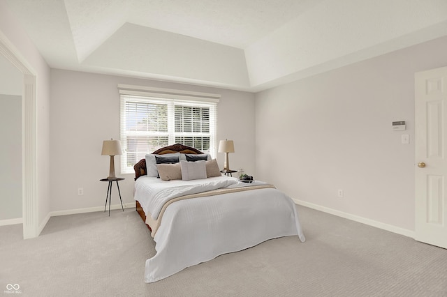 5761 Coopers Hawk Dr, Carmel, IN 46033 - bedroom with a raised ceiling and light colored carpet
