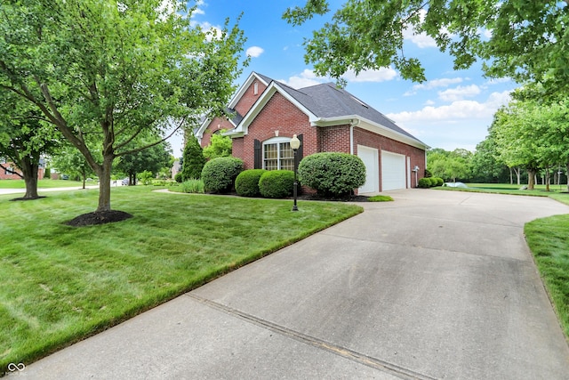 5761 Coopers Hawk Dr, Carmel, IN 46033 - view of front facade with brick siding, a garage, a front yard, and driveway