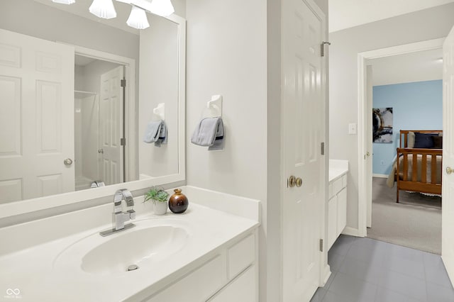 5761 Coopers Hawk Dr, Carmel, IN 46033 - full bathroom with vanity, tile patterned flooring, and a shower