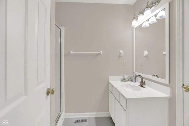 5761 Coopers Hawk Dr, Carmel, IN 46033 - full bath with vanity, tile patterned floors, and a shower with door