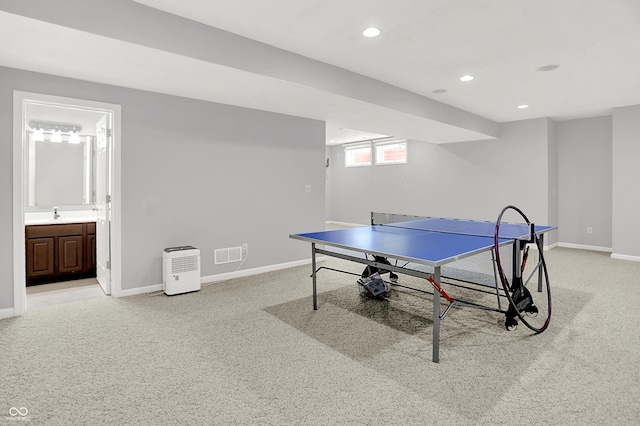 5761 Coopers Hawk Dr, Carmel, IN 46033 - rec room with light colored carpet and recessed lighting