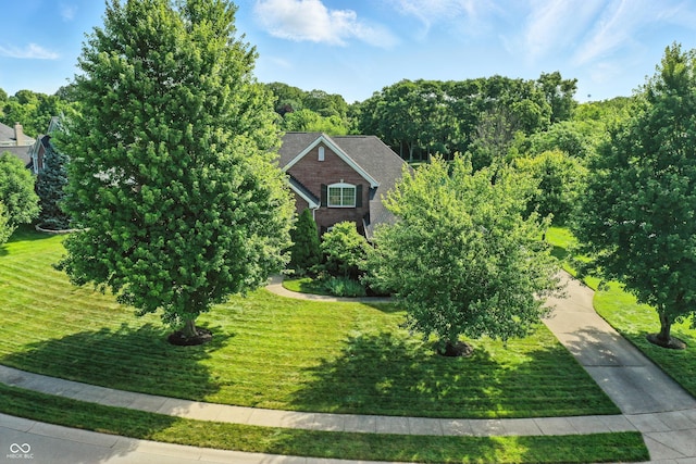 5761 Coopers Hawk Dr, Carmel, IN 46033 - view of front of home featuring a front lawn and brick siding