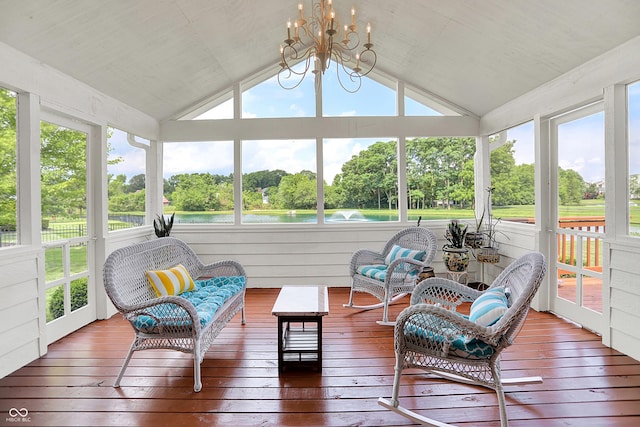 5761 Coopers Hawk Dr, Carmel, IN 46033 - sunroom with view of wooded area, a chandelier, vaulted ceiling, and a water view