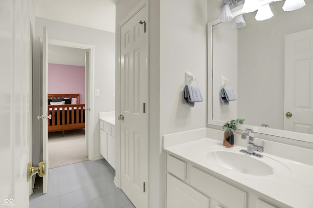 5761 Coopers Hawk Dr, Carmel, IN 46033 - bathroom with vanity and tile patterned flooring