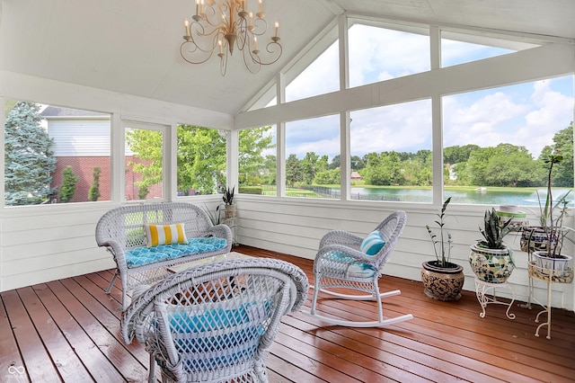 5761 Coopers Hawk Dr, Carmel, IN 46033 - sunroom / solarium with a water view, lofted ceiling, a chandelier, and view of wooded area