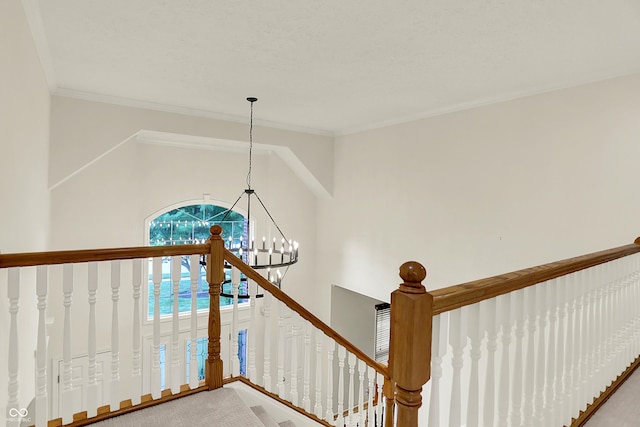 5761 Coopers Hawk Dr, Carmel, IN 46033 - stairway with a chandelier, carpet flooring, and crown molding
