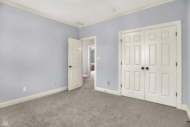 2263 Glebe St, Carmel, IN 46032 - unfurnished bedroom featuring ornamental molding, carpet flooring, and a closet