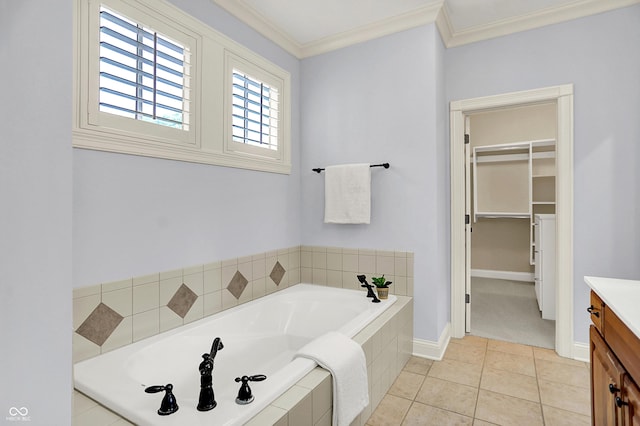 2263 Glebe St, Carmel, IN 46032 - full bath featuring vanity, a bath, a walk in closet, ornamental molding, and tile patterned floors