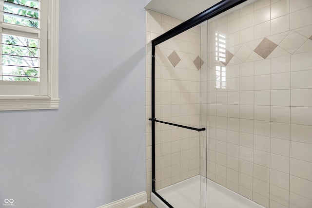 2263 Glebe St, Carmel, IN 46032 - full bath featuring a stall shower and baseboards