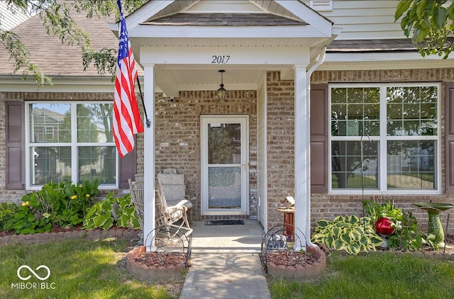 2017 Shadow Creek Blvd, Columbus, IN 47201 - property entrance with brick siding and a porch