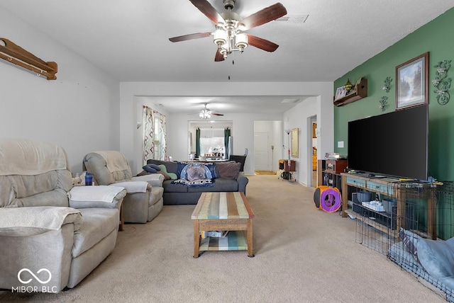 2017 Shadow Creek Blvd, Columbus, IN 47201 - living area featuring a ceiling fan and light colored carpet