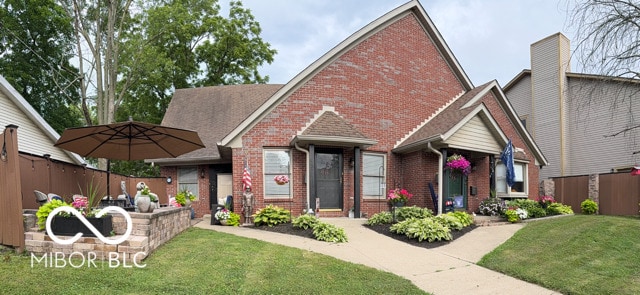 18 Hough St, Greenfield, IN 46140 - traditional-style house featuring brick siding