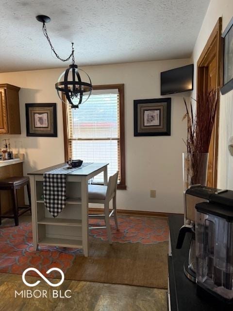 18 Hough St, Greenfield, IN 46140 - dining area with a textured ceiling and a chandelier