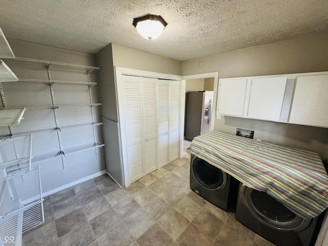 1345 S Biltmore Ave, Indianapolis, IN 46241 - kitchen with white cabinetry and stainless steel refrigerator with ice dispenser