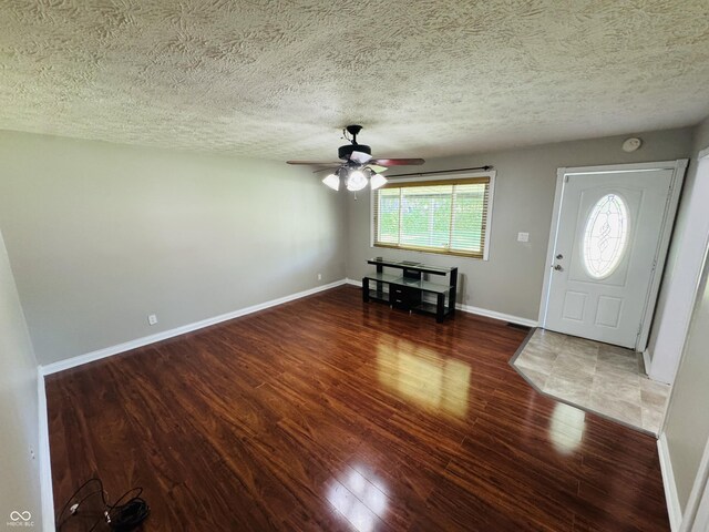 1345 S Biltmore Ave, Indianapolis, IN 46241 - entrance foyer featuring wood finished floors, ceiling fan, and a textured ceiling
