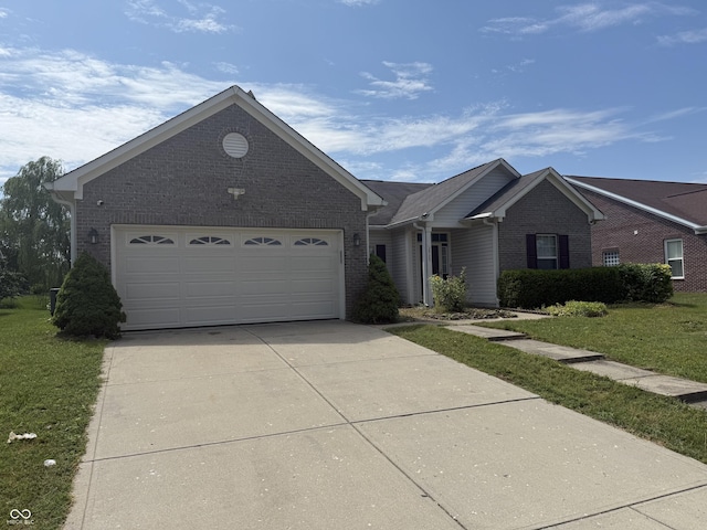 2929 Tuscarora Ln, Indianapolis, IN 46217 - ranch-style house with brick siding, concrete driveway, a garage, and a front lawn