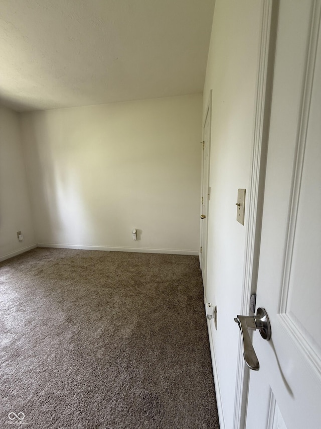 2929 Tuscarora Ln, Indianapolis, IN 46217 - carpeted spare room with baseboards