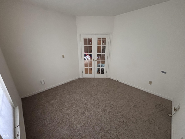 2929 Tuscarora Ln, Indianapolis, IN 46217 - carpeted empty room featuring french doors and baseboards
