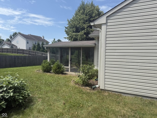 2929 Tuscarora Ln, Indianapolis, IN 46217 - view of yard featuring a sunroom