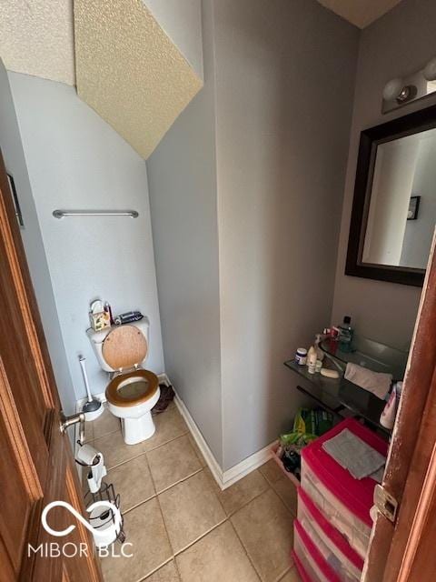 2230 Cedarmill Dr, Franklin, IN 46131 - bathroom featuring tile patterned flooring and a textured ceiling