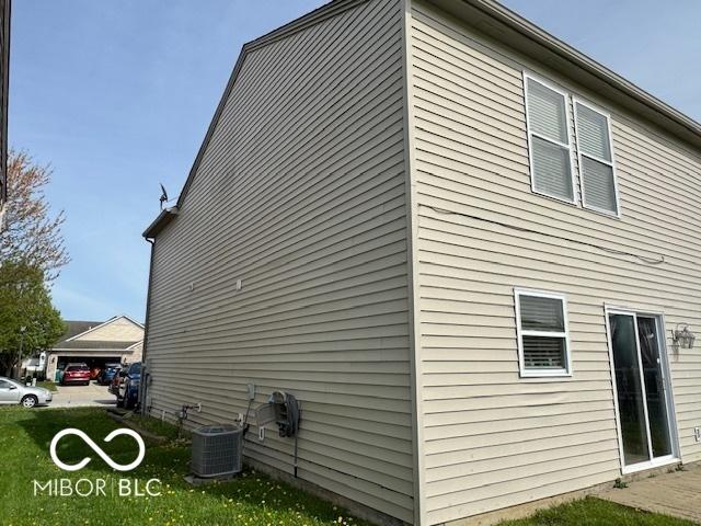 2230 Cedarmill Dr, Franklin, IN 46131 - view of home's exterior featuring a lawn