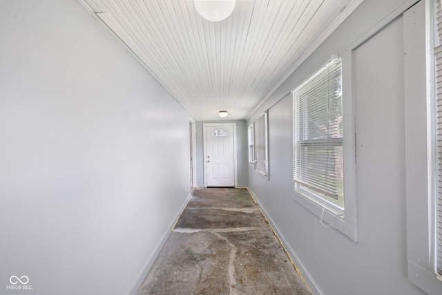 615 Udell St, Indianapolis, IN 46208 - corridor featuring unfinished concrete flooring and baseboards