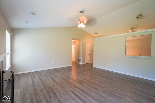 6029 Sycamore Forge Dr, Indianapolis, IN 46254 - unfurnished living room with dark wood-style floors, vaulted ceiling, and a ceiling fan