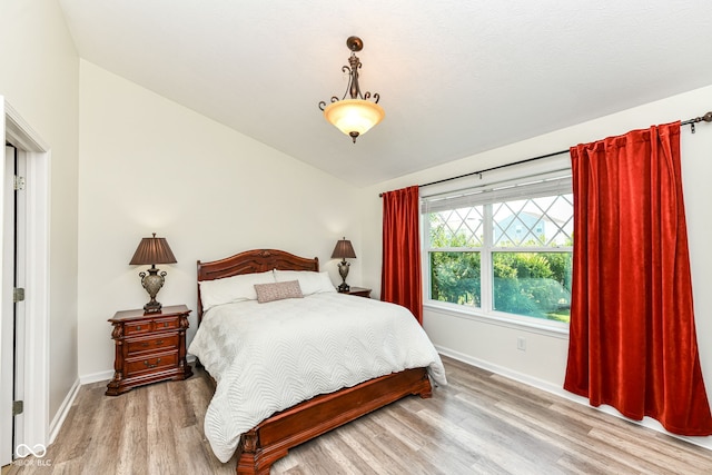 5765 White Pine Rd, Whitestown, IN 46075 - bedroom with wood finished floors and vaulted ceiling