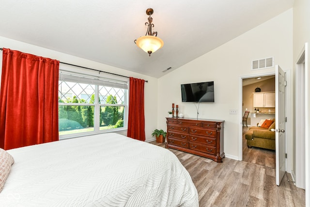 5765 White Pine Rd, Whitestown, IN 46075 - bedroom with wood finished floors and high vaulted ceiling