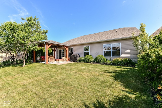 5765 White Pine Rd, Whitestown, IN 46075 - back of house with a gazebo, a patio area, and roof with shingles
