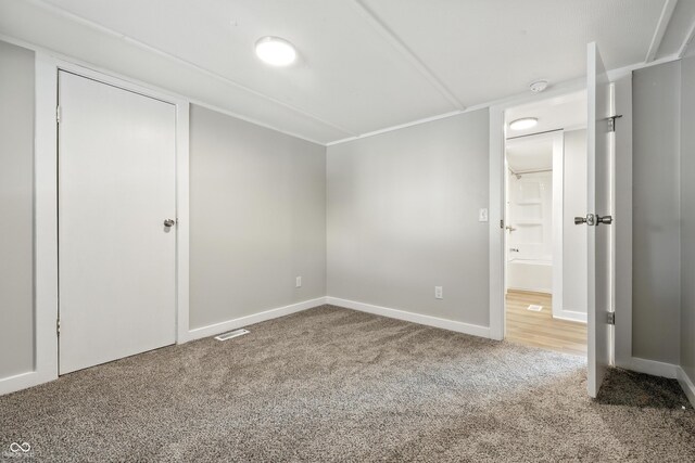 212 N 13th St, Elwood, IN 46036 - unfurnished bedroom featuring carpet flooring and baseboards