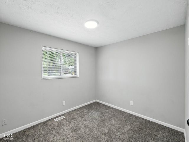 2853 S State Ave, Indianapolis, IN 46203 - unfurnished room featuring dark colored carpet and baseboards