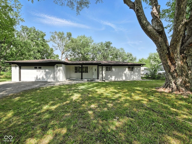 2853 S State Ave, Indianapolis, IN 46203 - ranch-style house featuring an attached garage, driveway, and a front yard