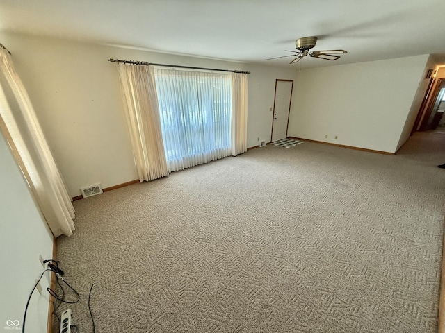 605 Redding Rd, Seymour, IN 47274 - spare room featuring carpet and a ceiling fan