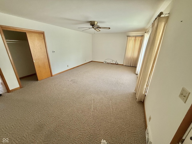 605 Redding Rd, Seymour, IN 47274 - unfurnished bedroom featuring carpet and ceiling fan