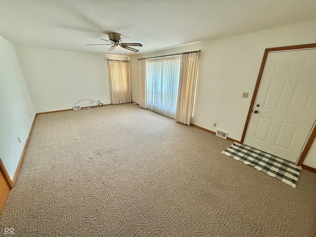605 Redding Rd, Seymour, IN 47274 - empty room with light colored carpet and ceiling fan